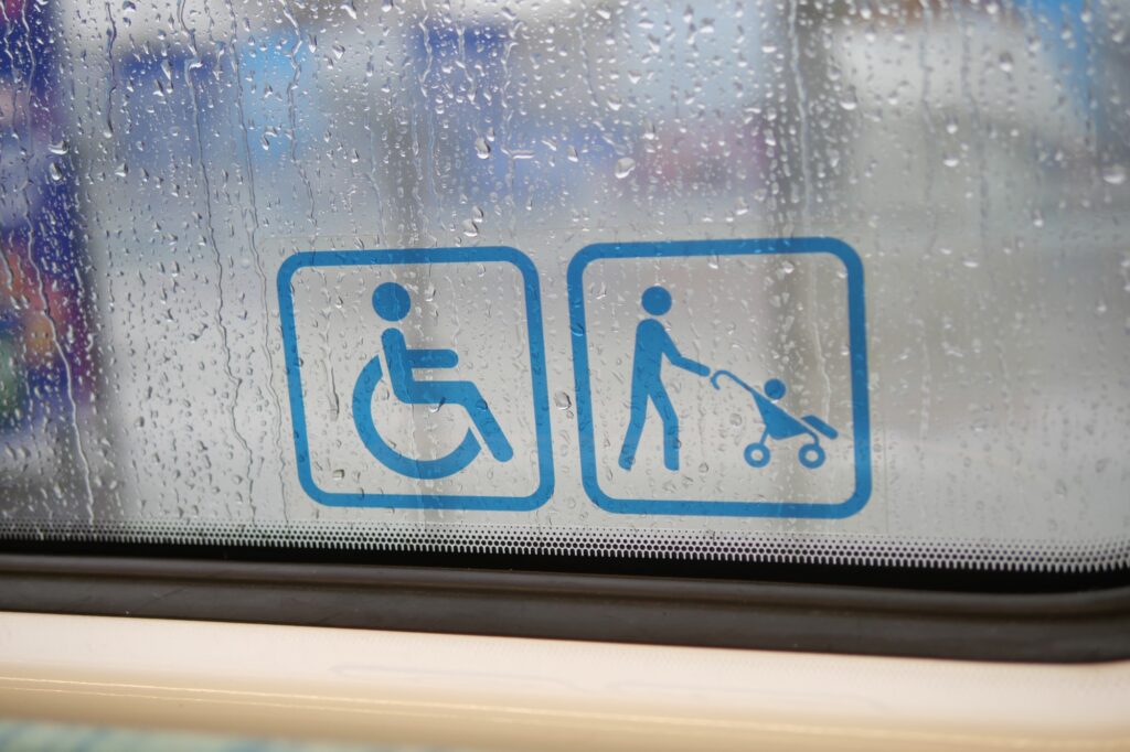 'Persons with disabilities' sign on the door of a subway car